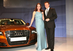Natalia W&ouml;erner und Michael Renz Leiter Vertrieb Deutschland AUDI AG am Auto, Audi A8 / TALK OF TOWN - AUDI A8 PREMIERE - THE ART OF PROGRESS - ICS MESSE STUTTGART in Stuttgart am 18. M&auml;rz 2010 / Foto: BrauerPhotos fuer AUDI